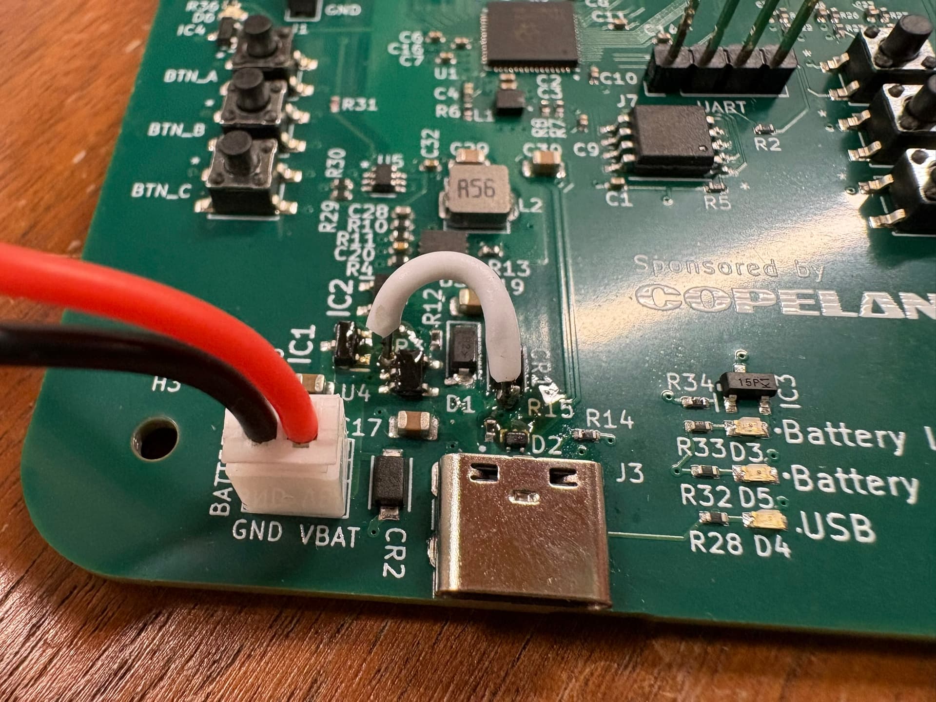image of the soldered jumper cable between charging IC and 3v3 line